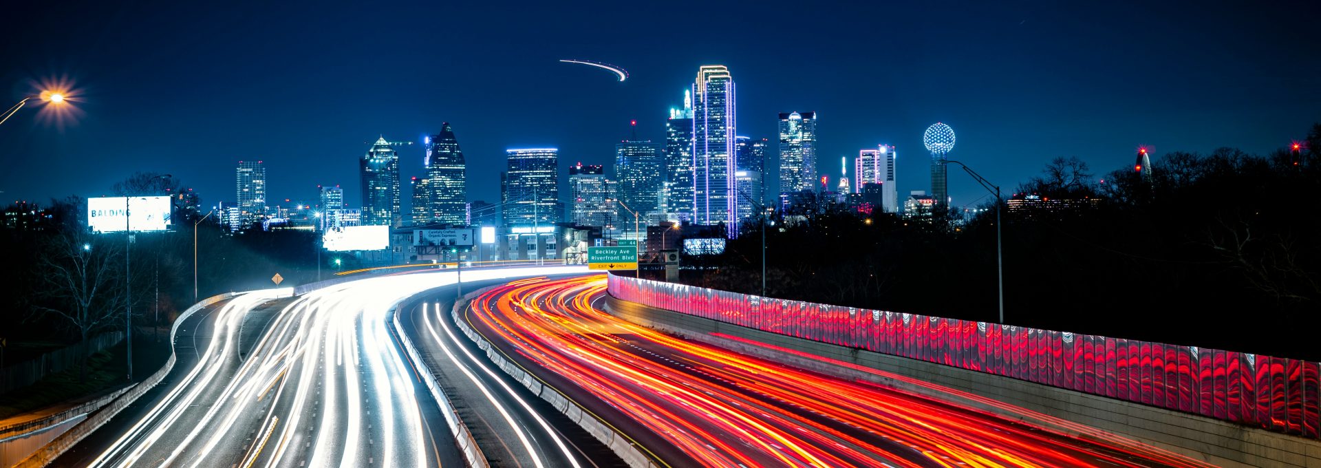 time lapse photography of cars on road during night time