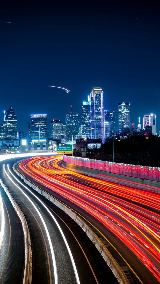 time lapse photography of cars on road during night time